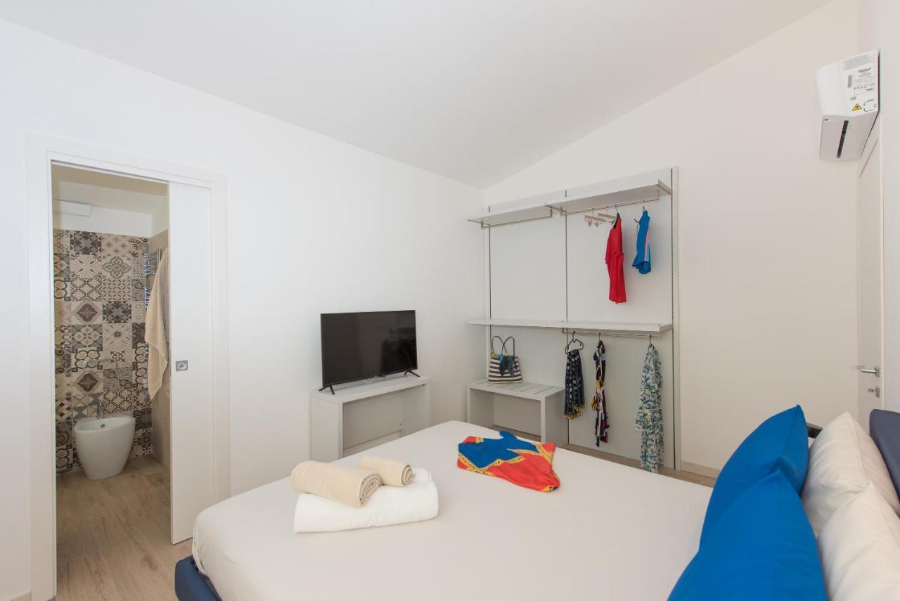Апартаменты Loft Lungomare Vista Mare E Monti Арбатакс Экстерьер фото